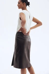 Jupe portefeuille en tissu enduit