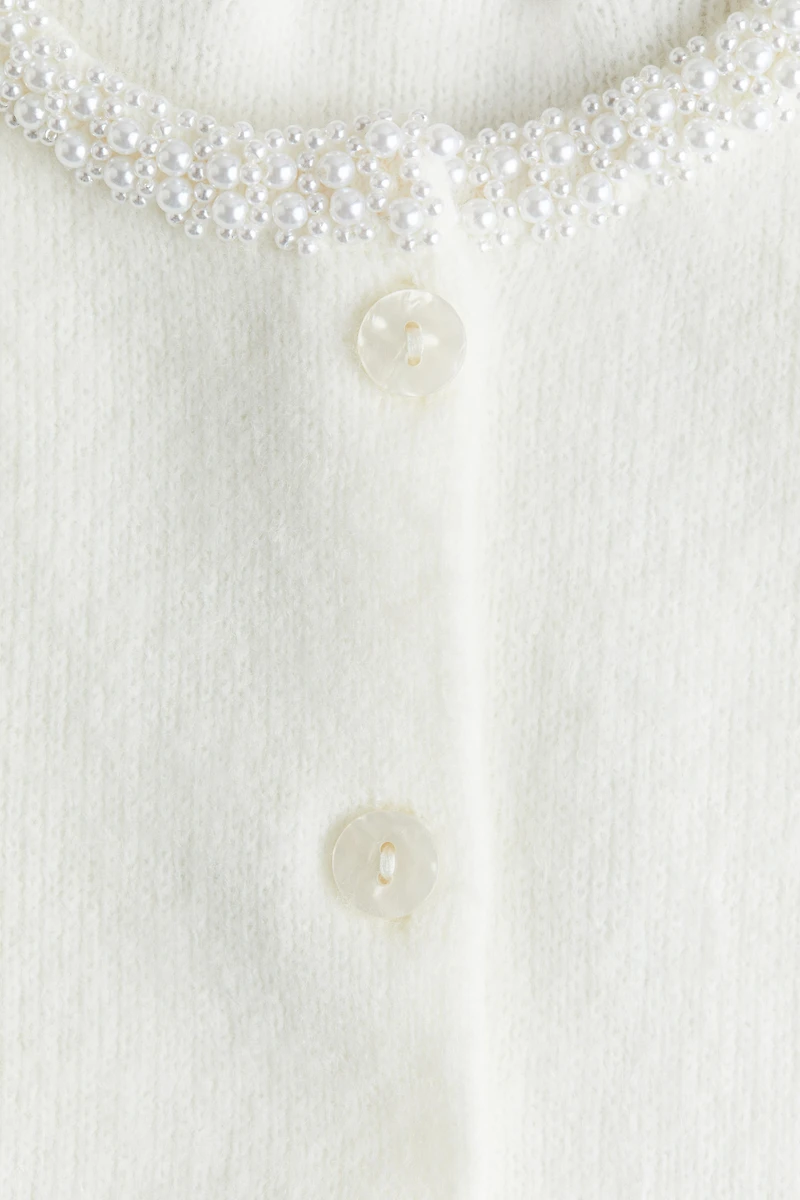 Chandail avec perles fantaisie