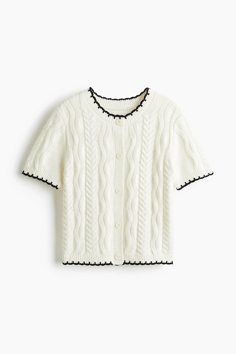 Gilet en tricot torsadé