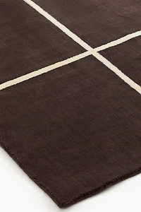 Grand tapis en laine mélangée