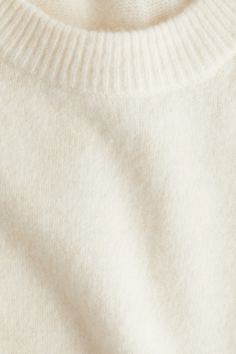 Chandail MAMA avec fentes latérales au bas