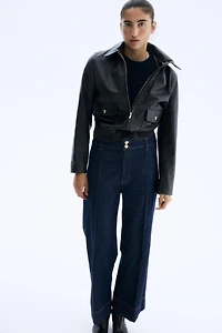 Jean ample à la cheville taille haute