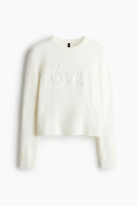 Chandail avec appliqué