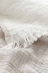 Jeté de lit frangé