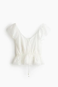 Blouse à manches volantées avec basque