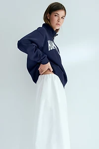 Chandail col à fermeture éclair et motifs