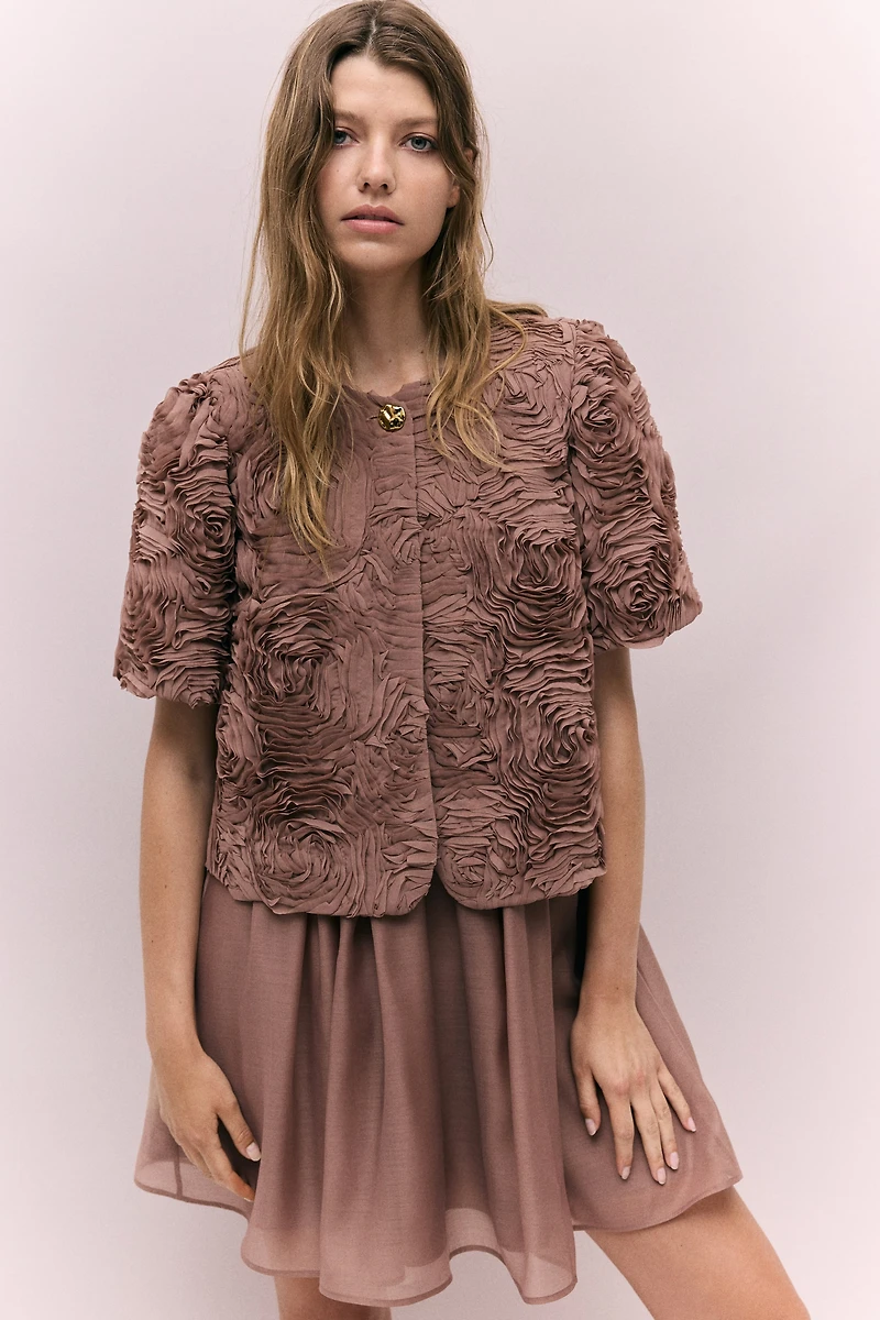 Veste avec appliqués