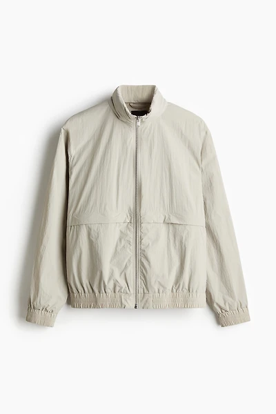 Veste coupe-vent flottante en nylon