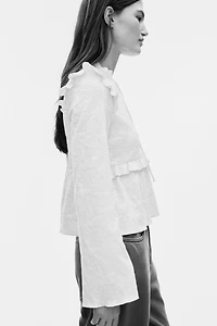 Blouse en jersey jacquard