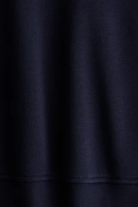 Chandail col à fermeture éclair et motifs