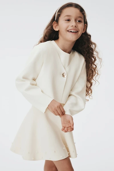 Chandail avec bouton