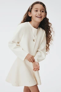 Chandail avec bouton