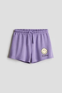 Short en molleton avec motifs