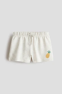 Short en molleton brodé