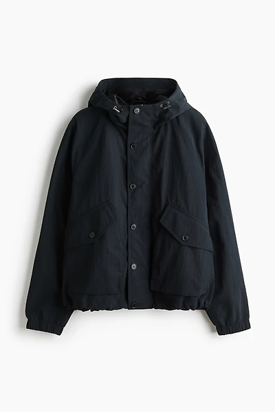 Veste coupe-vent à capuche en nylon