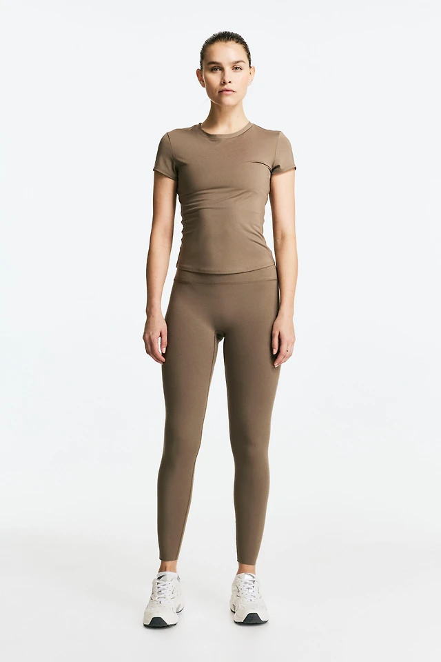 Shop H&M Sports Leggings ShapeMove™ at Beverly Center in Los