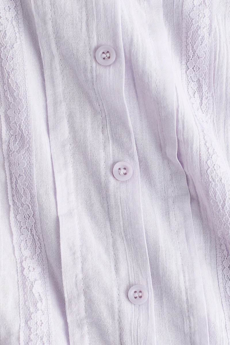 Blouse à plis nervurés