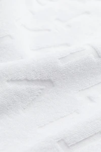 Serviette de bain en coton éponge