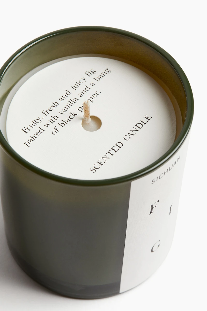 Bougie parfumée dans un pot en verre