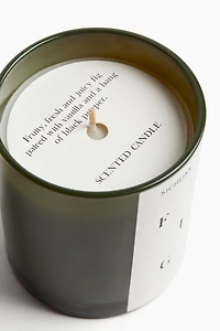 Bougie parfumée dans un pot en verre