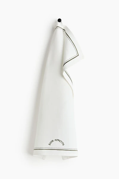 Linge à vaisselle avec motifs brodés