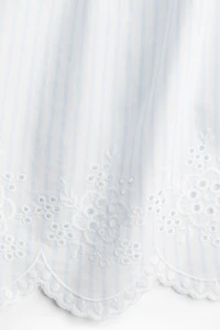 Embroidered tie-strap top