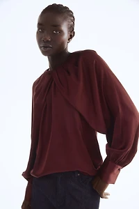 Blouse en satin avec manches ballon