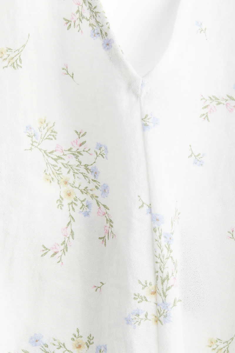 Robe à bretelles fines avec dos ouvert