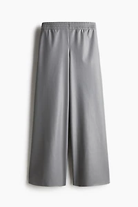 Pantalon de jogging large en tissus enduit