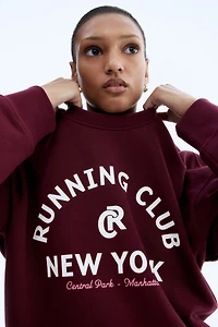 Sweatshirt with Text Motif