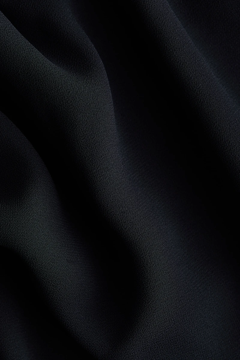 Robe à effet drapé col cheminée