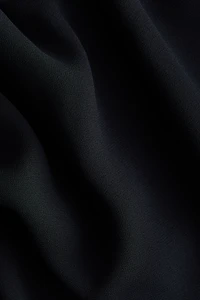 Robe à effet drapé col cheminée