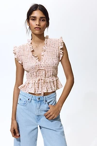 Blouse sans manches en nid d'abeille