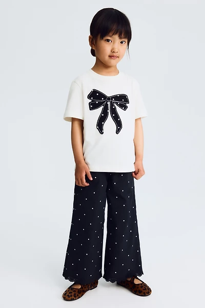 Pantalon en crépon de coton avec dentelle