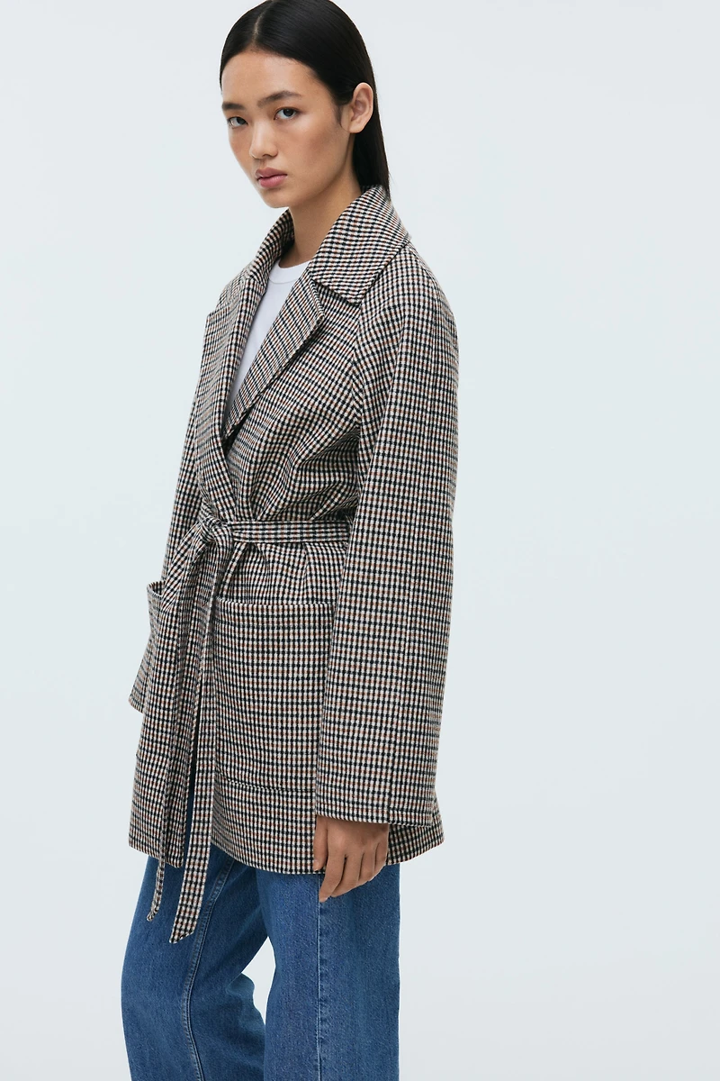 Manteau avec ceinture à nouer