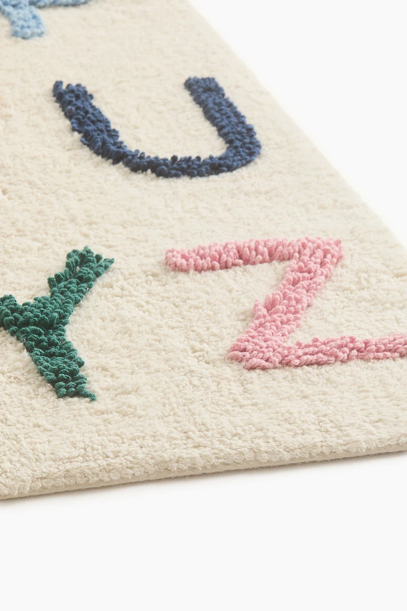 Tapis en coton bouclé