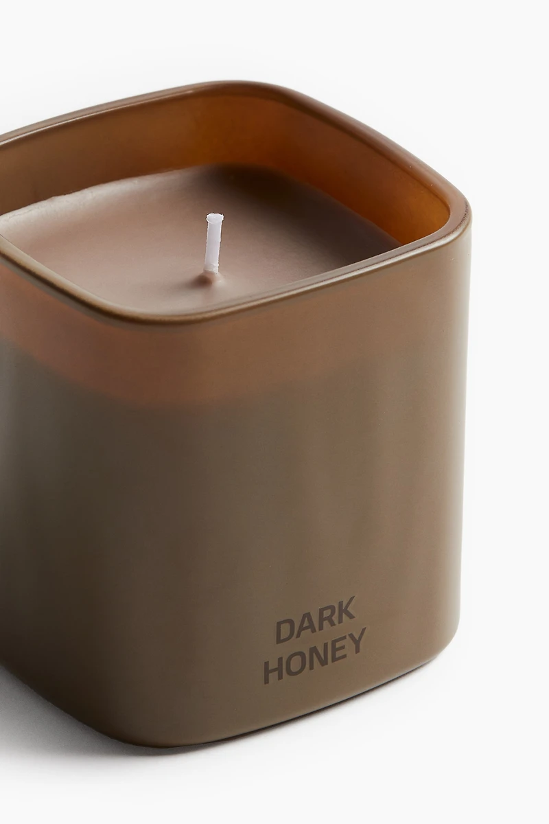 Bougie parfumée dans un pot en verre