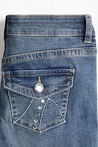 Jean taille basse jambes évasées