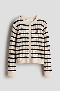 Gilet en tricot torsadé