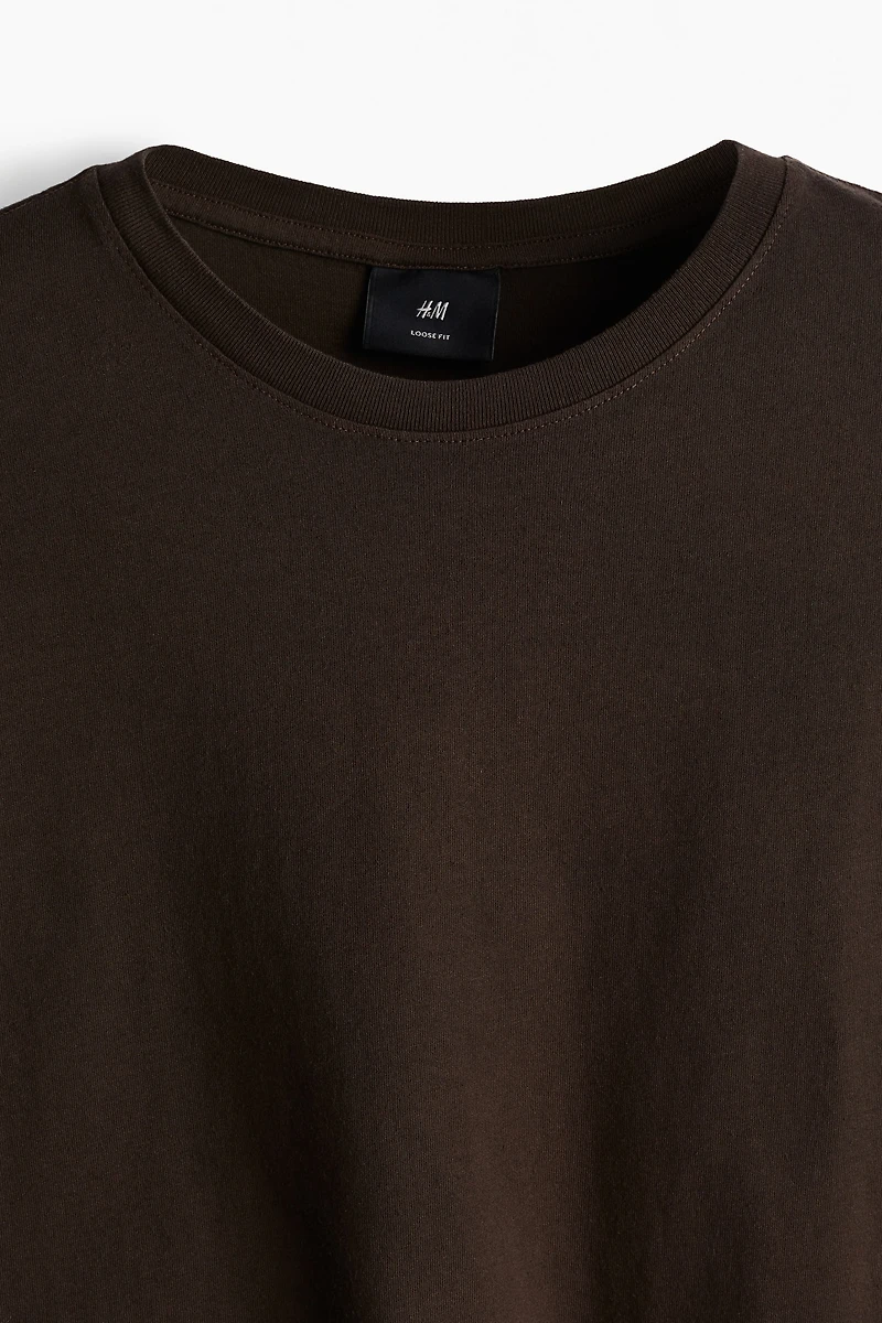 T-shirt flottant à l'aspect délavé