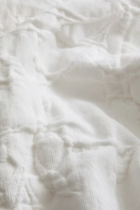 Housse de coussin en tissu jacquard