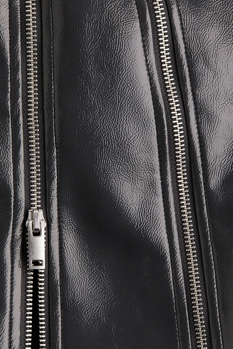 Jupe en tissu enduit avec fermetures éclair