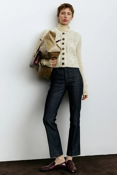 Jean aux chevilles évasé taille haute