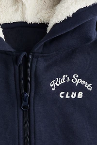 Veste à capuche fermeture éclair détails brodés