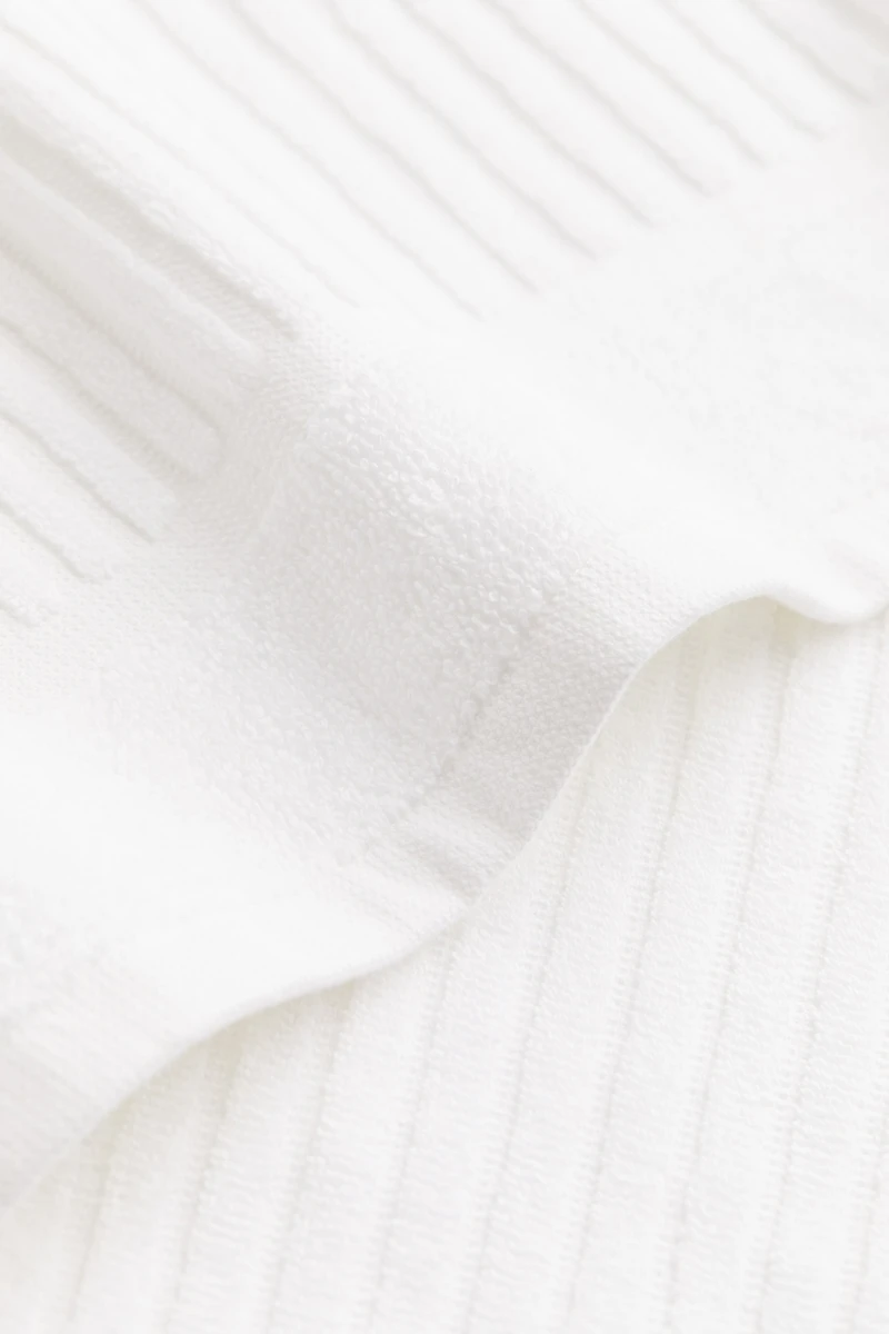 Serviette de bain en coton éponge