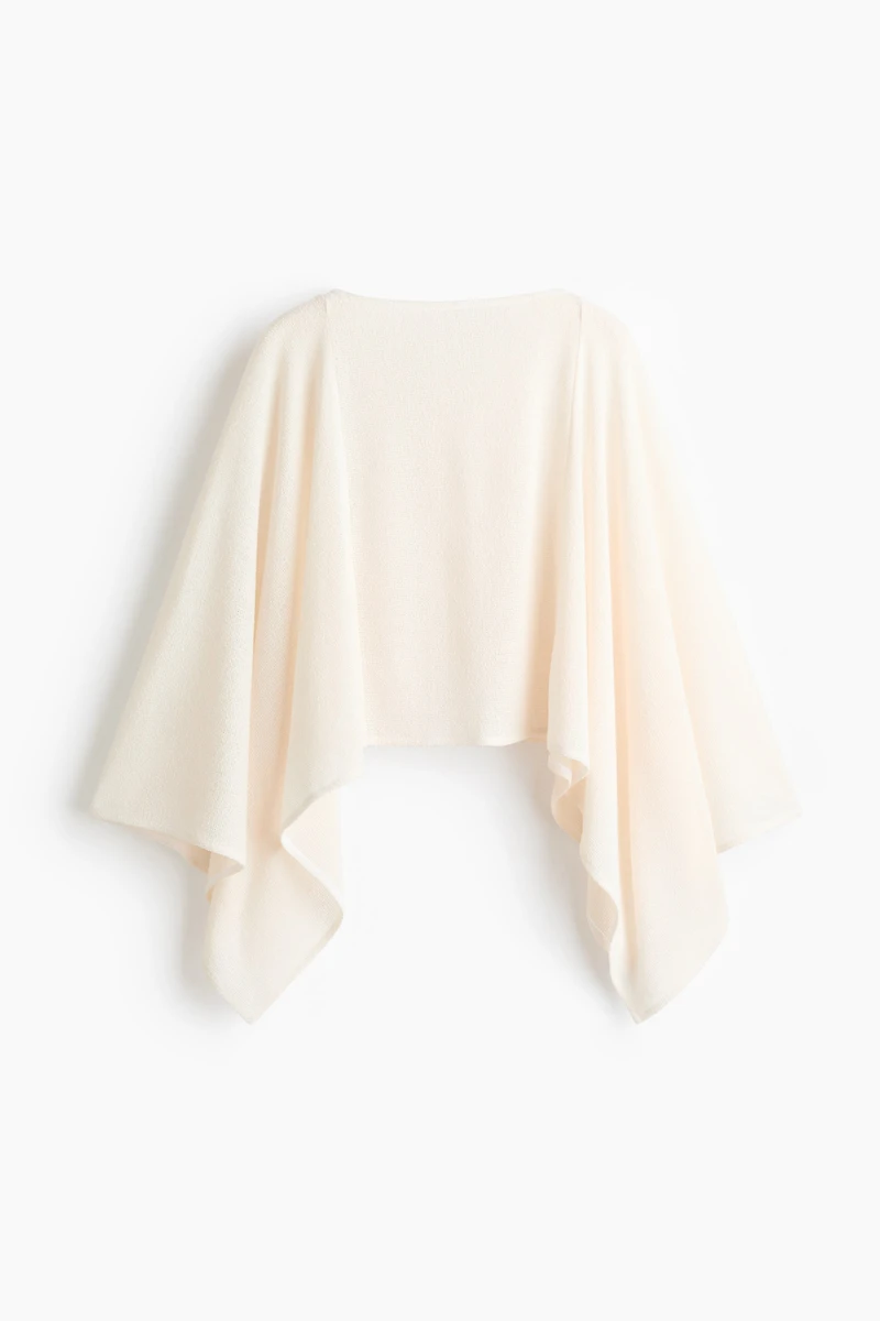 Cape en tricot fin
