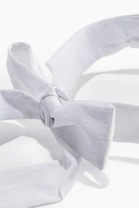 Bow-Detail Sun Visor