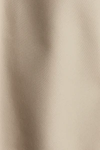 Pantalon évasé avec plis devant
