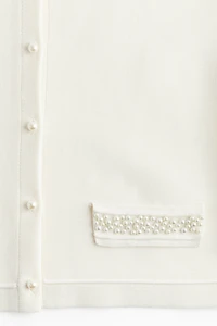 Gilet avec perles de fantaisie