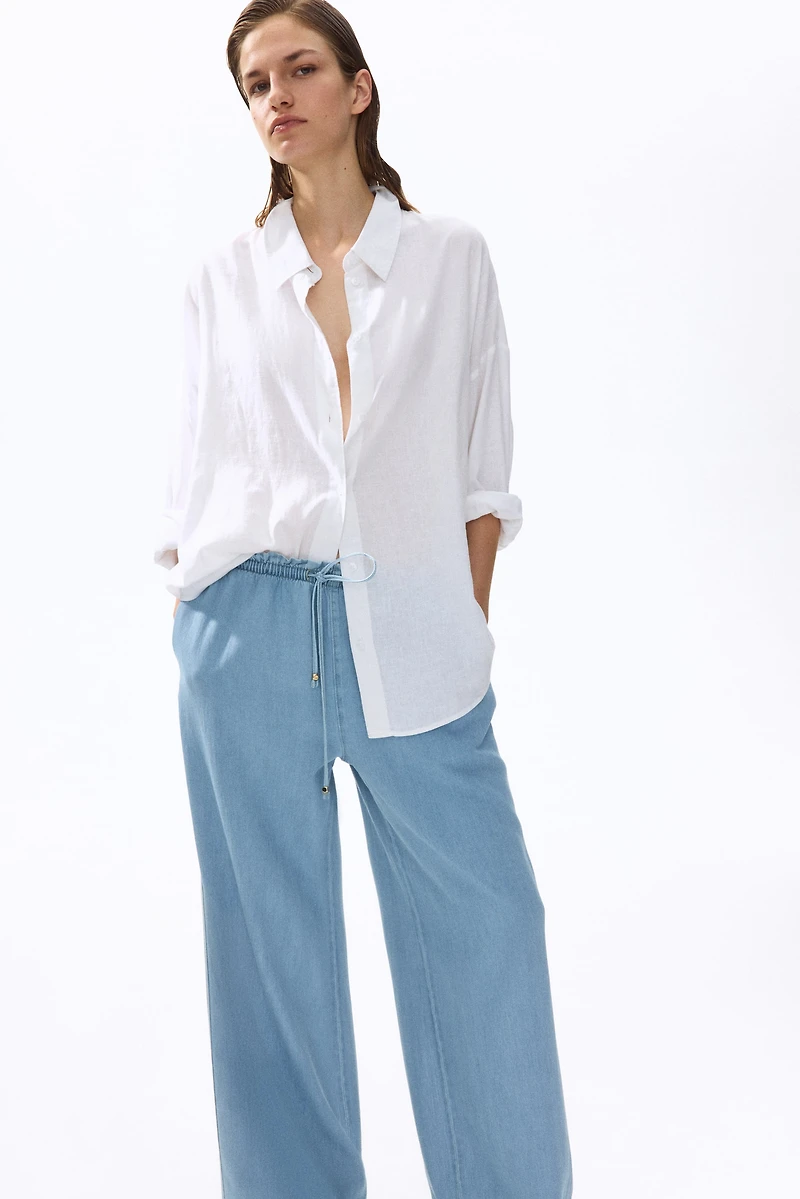 Pantalon taille froncée à jambes larges